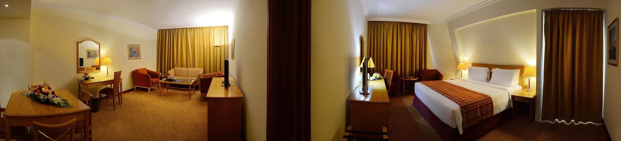 Swiss-Belhotel Sharjah Quarto foto