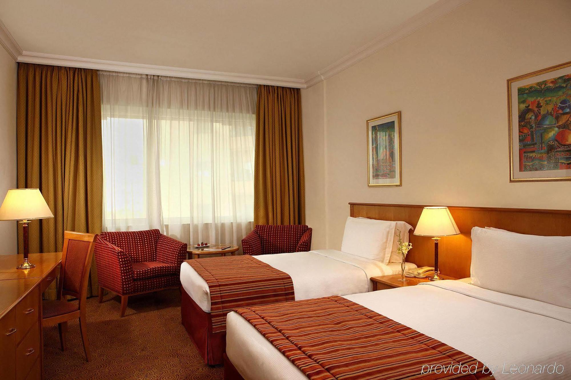 Swiss-Belhotel Sharjah Quarto foto